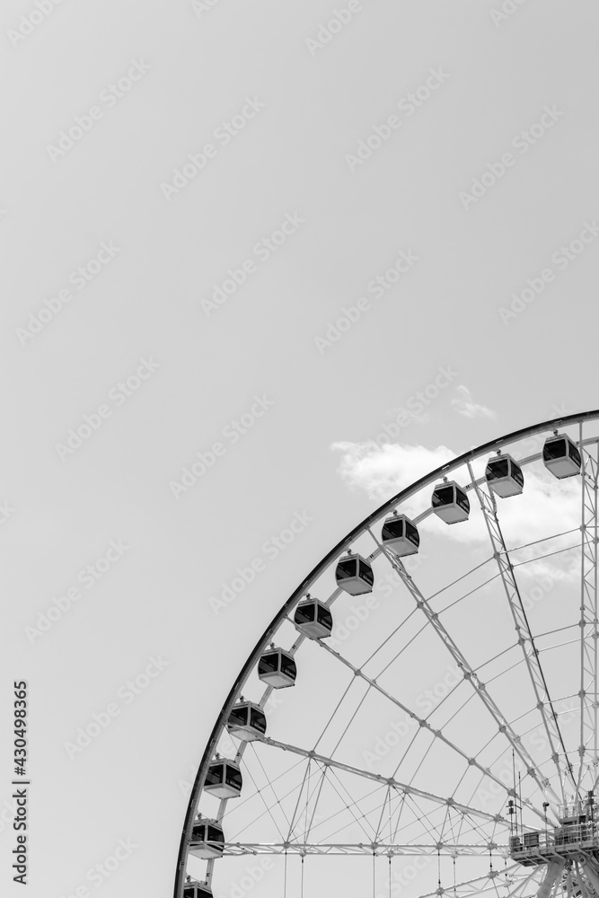 ferris wheel on a sky black and white