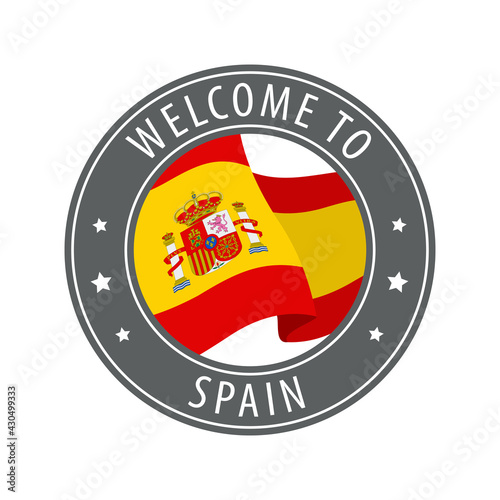 Welcome to Spain. Gray stamp with a waving country flag.