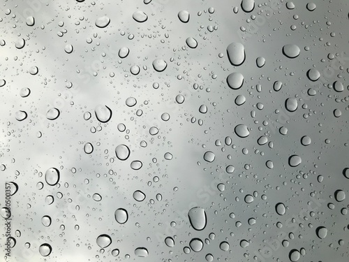 rain water drops on the window glass texture.