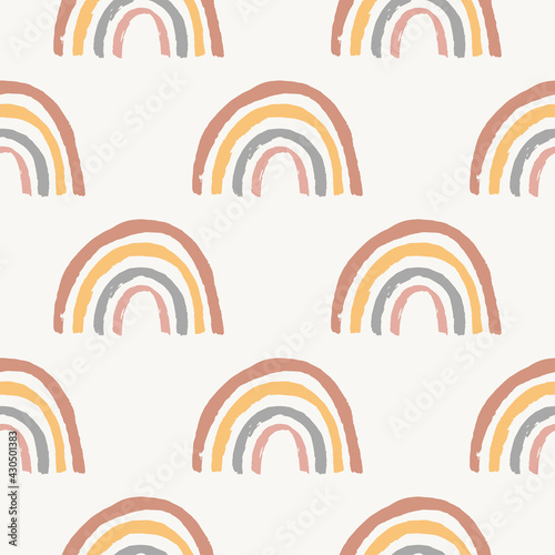 Trendy rainbow vector seamless pattern. Hand drawn boho nursery rainbows illustration. Cute magic design for baby shower, kids and baby clothes print, poster for nursery room, card.