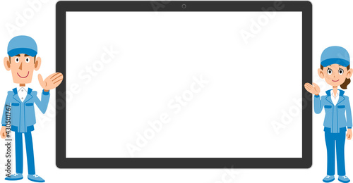 横置きのタブレットPCの前で案内する作業着を着た男女
