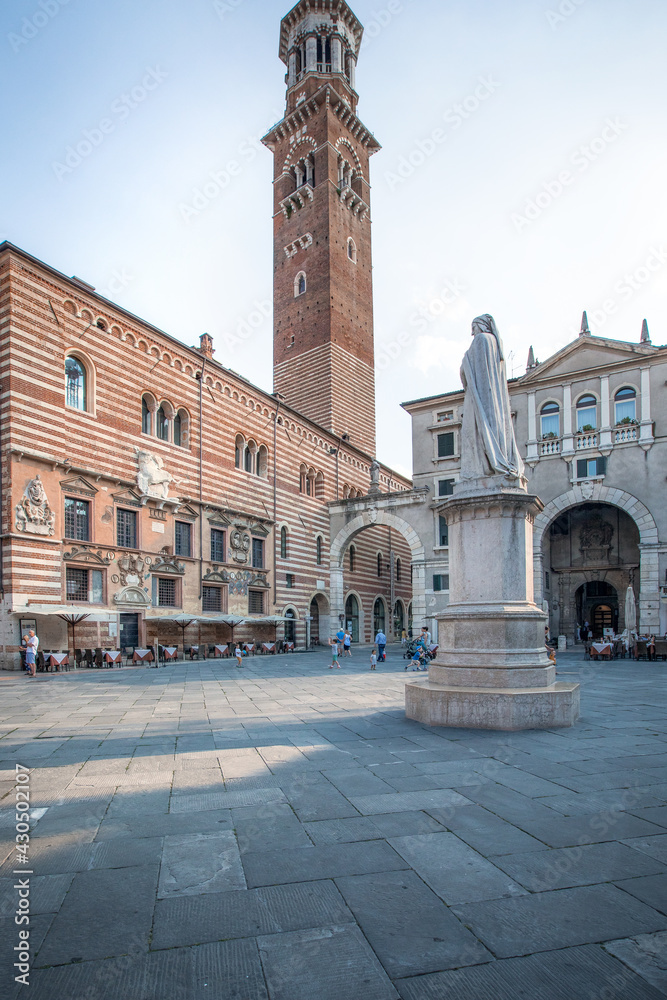 Verona, Italy, 07.04.2019: view of Piazza dei Signori_notable buildings_statue of Dante Alighieri_Verona