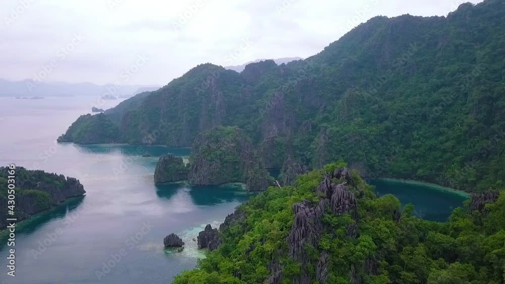 Aerial of Twin Lagoon and mountain coastline, Coron, Palawan, Philippines. Aerial of Twin Lagoon and mountain coastline, Coron, Palawan, Philippines.