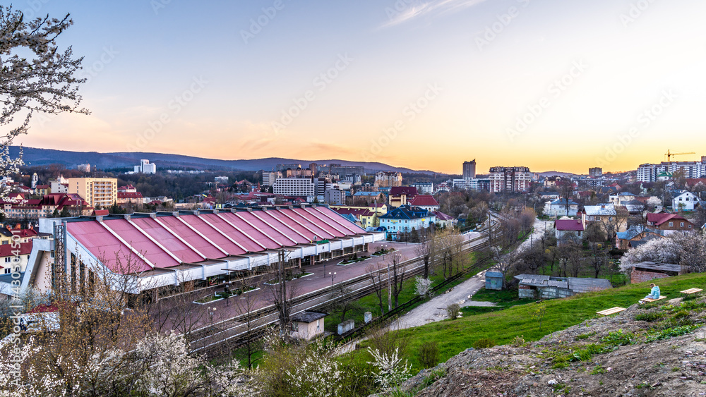 TRUSKAVETS, UKRAINE - April 25, 2021: View from Goshivska Mountain, from which the entire Truskavets of the Lviv region can be seen. Ukraine. Sunset.