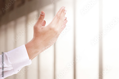 Muslim man raised hands and praying