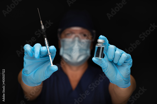 Doctor or Nurse Holding Med...