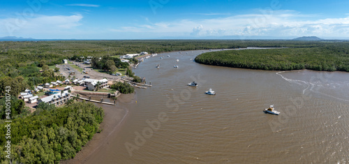 Fishing boats, jetty and lodge at Lucinda in Far North Queensland, Australia