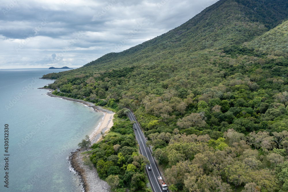 Aerial view of the Captain Cook Highway between Cairns and Port Douglas in Queensland Australia on a stormy day