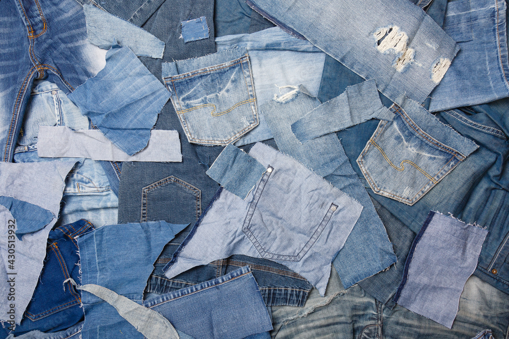 Old denim garbage background. Recycling old jeans. Old blue jeans ready for  recycling on wooden table. Denim upcycle. Circular economy. Pile of  discarded old blue jeans. Zero waste Stock Photo | Adobe