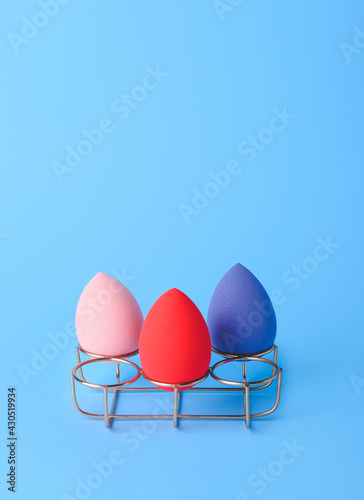 Three colorful makeup spong...