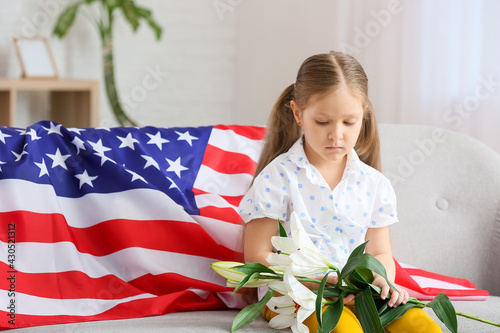 Little girl with USA flag a...