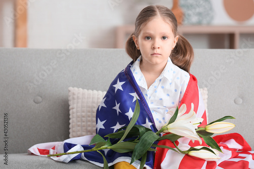 Little girl with USA flag a...
