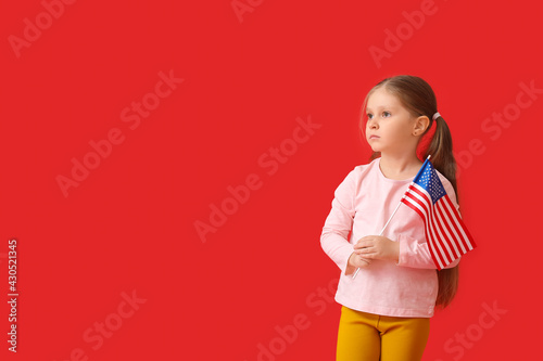 Little girl with USA flag o...