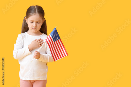 Little girl with USA flag o...
