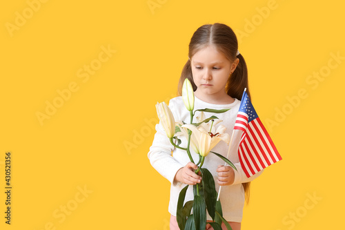 Little girl with USA flag a...