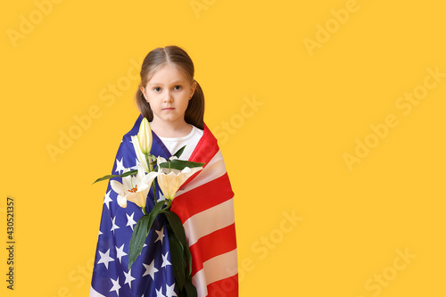 Little girl with USA flag a...
