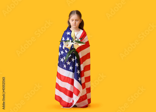 Little girl with USA flag a...