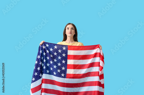 Young woman with USA flag o...