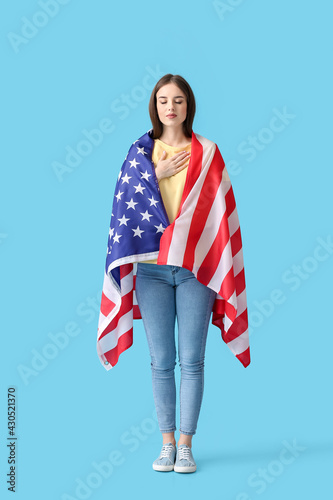 Young woman with USA flag o...
