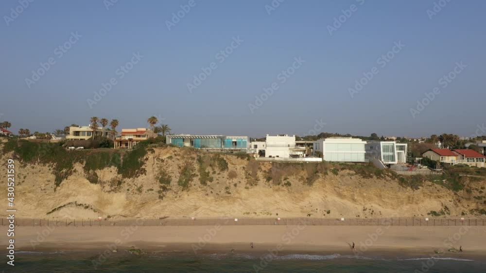 Aerial view of Herzliya coastline, with waterfront hotels and Herzliya Pituah houses. Aerial view of Herzliya coastline, with waterfront hotels and Herzliya Pituah houses.
