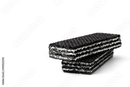 Black wafers isolated on white background.