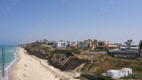 Aerial view of Herzliya coastline, with waterfront hotels and Herzliya Pituah houses. photo