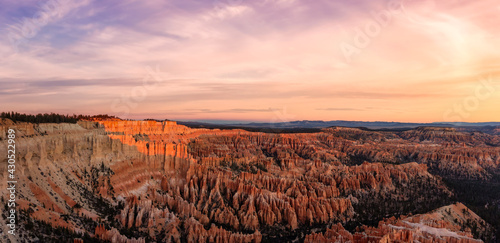 Aerial panoramic view of the American Canyon Landscape. Colorful Cloudy Sunrise Artistic Render. Taken in Bryce Canyon National Park, Utah, United States. Nature Background Panorama