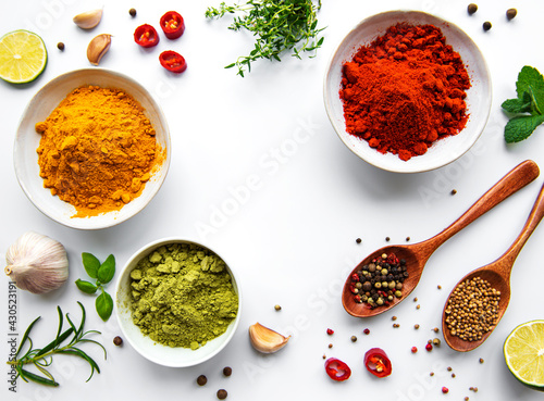 Fototapeta Naklejka Na Ścianę i Meble -  Various spices isolated on white background, top view