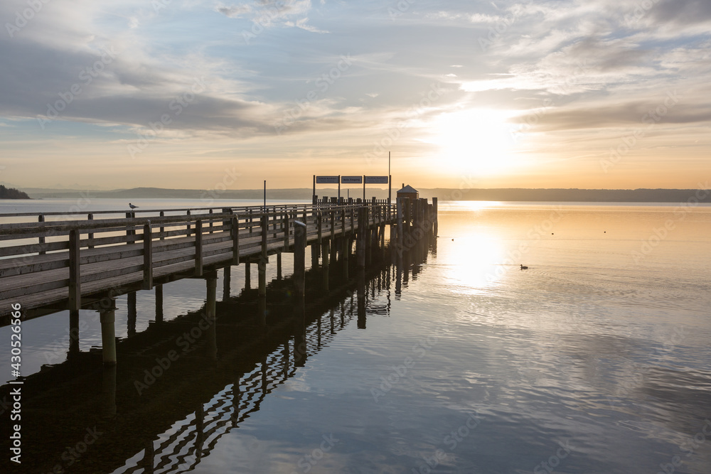 Sunset at the main pier of Herrsching am Ammersee. Popular sightseeing destination in upper bavaria.