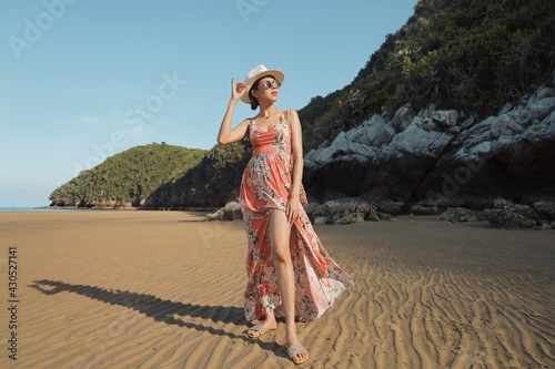 woman in a dress on a beach