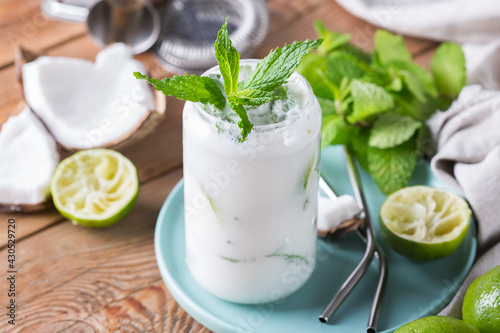 Tropical Caribbean cocktail mojito with coconut cream and hard seltzer