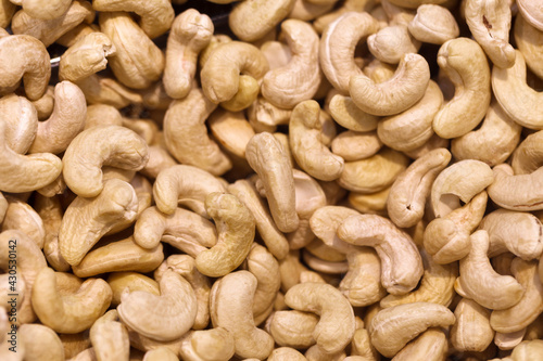 Сashew nuts, piled in bulk, in food market.