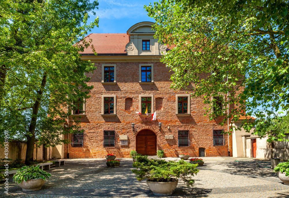 Renaissance Lubranski Academy, currently Archdiocese Museum historic Ostrow Tumski island at Cybina river in Poznan, Poland
