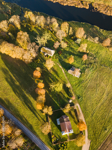 Aerial view of Lenas catholic church in sunny autumn evening, Latvia. photo