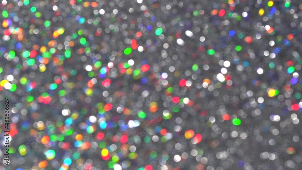 Magical festive silver background for Ramadan. Neon pastel bright magic lights abstract background. Blurred colorful light dots. Dust or flying particles Magical festive silver background for Ramadan. Neon pastel bright magic lights abstract background. Blurred colorful light dots. Dust or flying particles