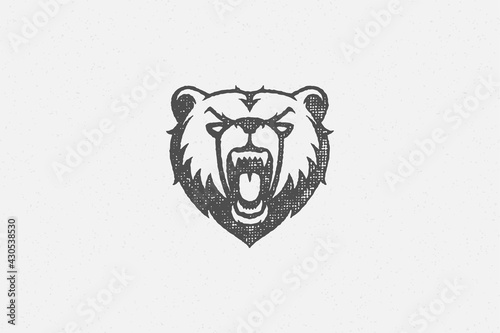 Head angry bear roaring as symbol power wildlife hand drawn stamp effect vector illustration.