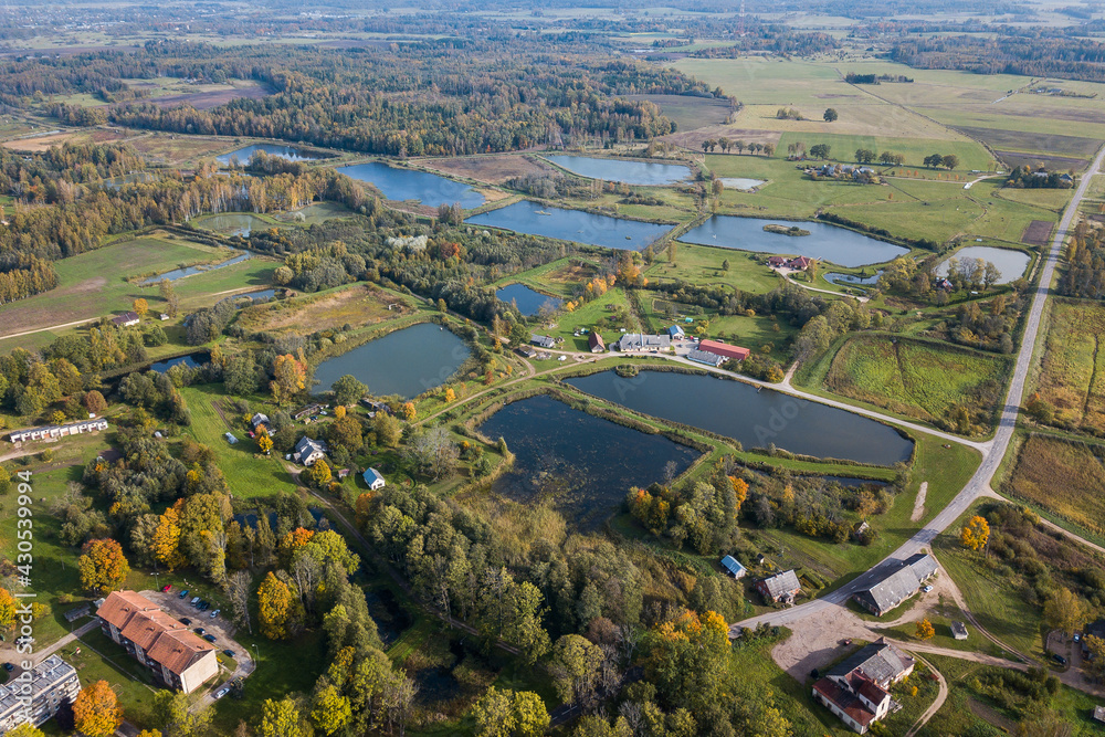 Aerial view of Pelci village in sunny autumn day, Latvia.