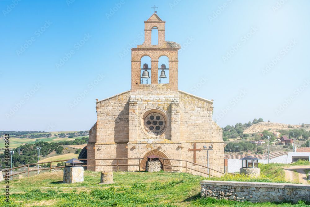 front view of a stone church in Castilian village in Spain