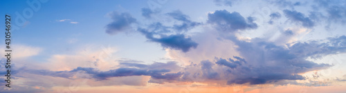 Panorama of Dramatic vibrant color with beautiful cloud of sunrise and sunset. Panoramic image. © yelantsevv