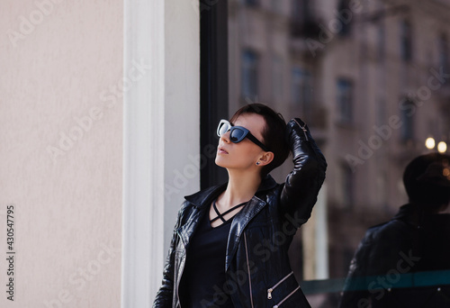 Lifestyle fashion woman posing on street © jozzeppe777