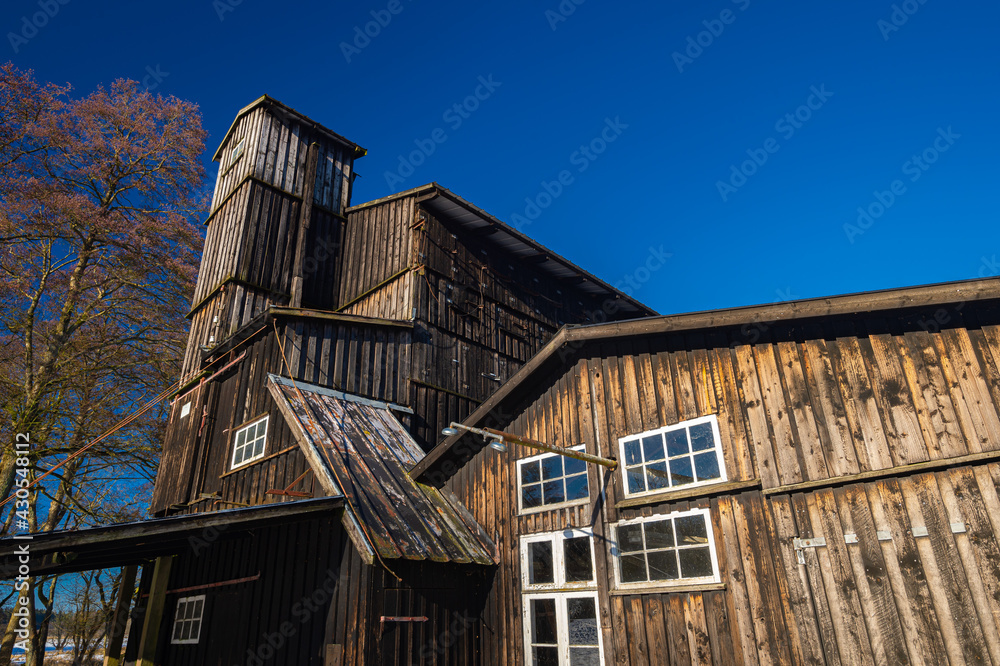 Klostermølle near Skanderborg. The old paper mill, with its black tar-treated wooden battens, testifies to a bygone industry Klostermølle near Skanderborg. The old paper mill, with its black tar-treated wooden battens, testifies to a bygone industry