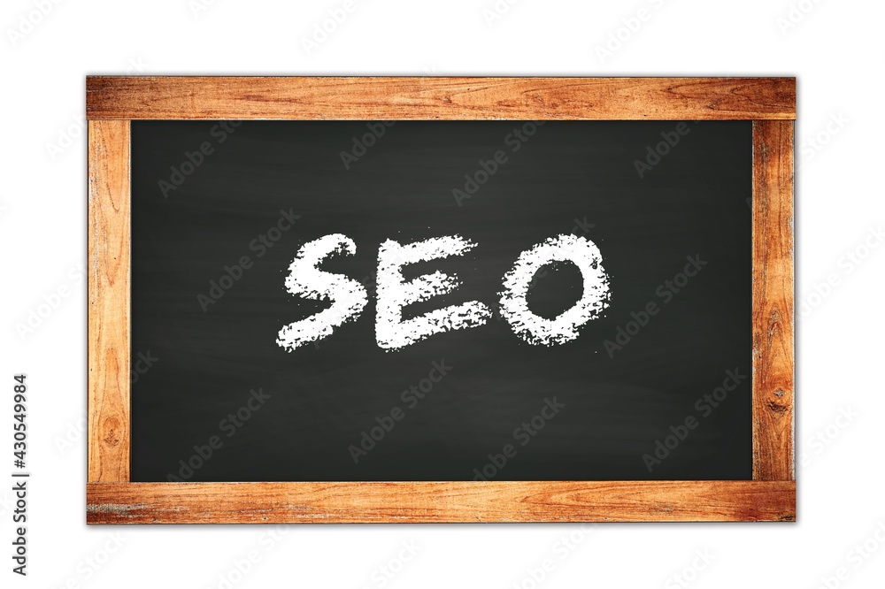 SEO text written on wooden frame school blackboard. SEO text written on wooden frame school blackboard.