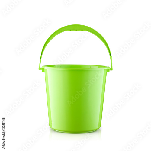 Green plastic bucket for household needs isolated on white background. Household products.