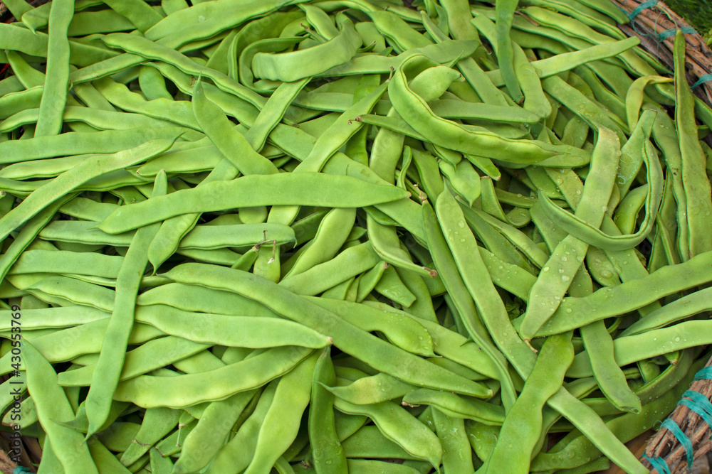 Green beans in the greengrocer. vegetable background. Green beans in the greengrocer. vegetable background.