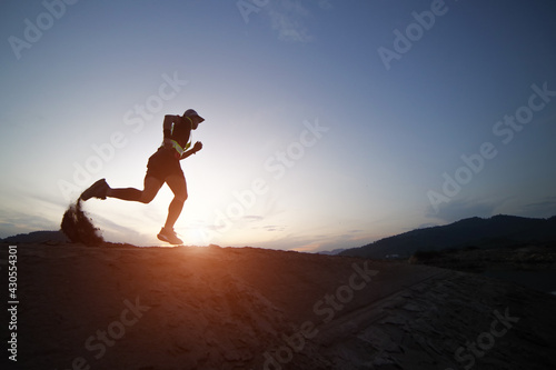 Athlete runner feet running on road  Jogging concept at outdoors. Man running for exercise.