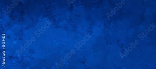Blue background concept with grungy pattern painted in grunge texture border design, abstract distressed panoramic banner with blank bright center