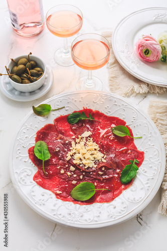 Beef carpaccio with capers and parmesan cheese