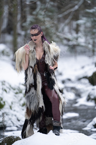 viking girl with leather fur clothes