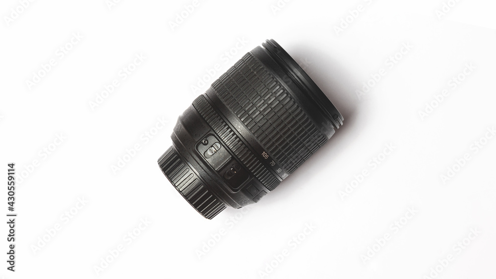 Camera lens. photographer's equipment. black wide lens on white background. photo concept Camera lens. photographer's equipment. black wide lens on white background. photo concept