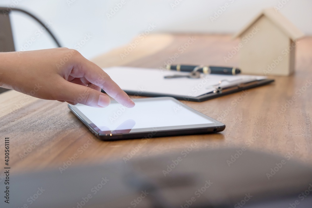 Fototapeta premium Business people signing contract making deal with real estate agent Concept for consultant and home insurance.Real estate investment Property insurance and security. Real estate agent offer house.